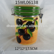 Ceramic storage jar with olive design for kitchen